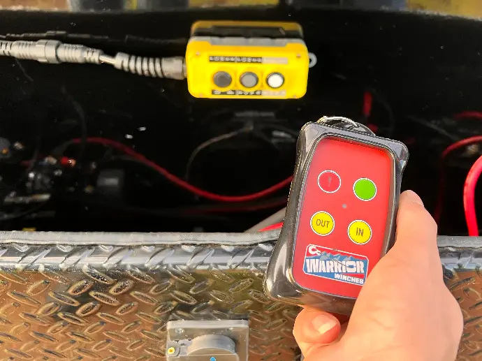 Wireless Controller for the Warrior Winch installed on the RDZ Roll Off Trailer