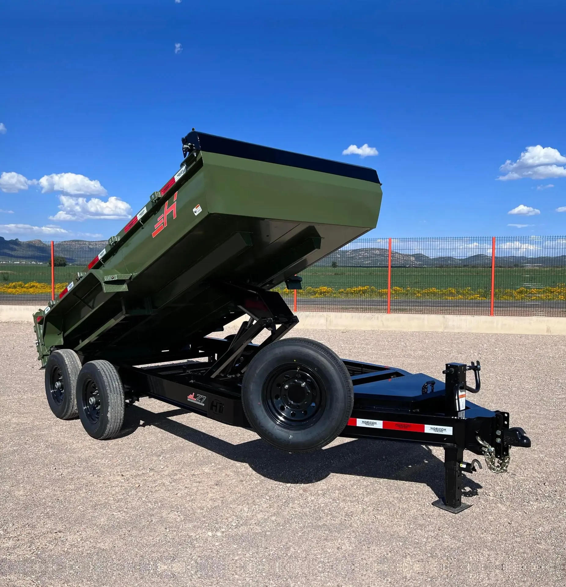 Front Side view of the tilted LZ7 Dump Trailer