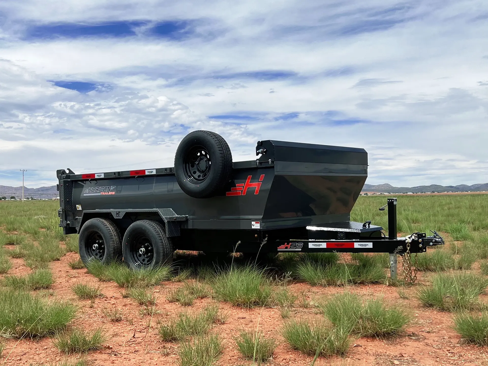 Small dump trailer with rounded sides the HZ6 Dump Trailer